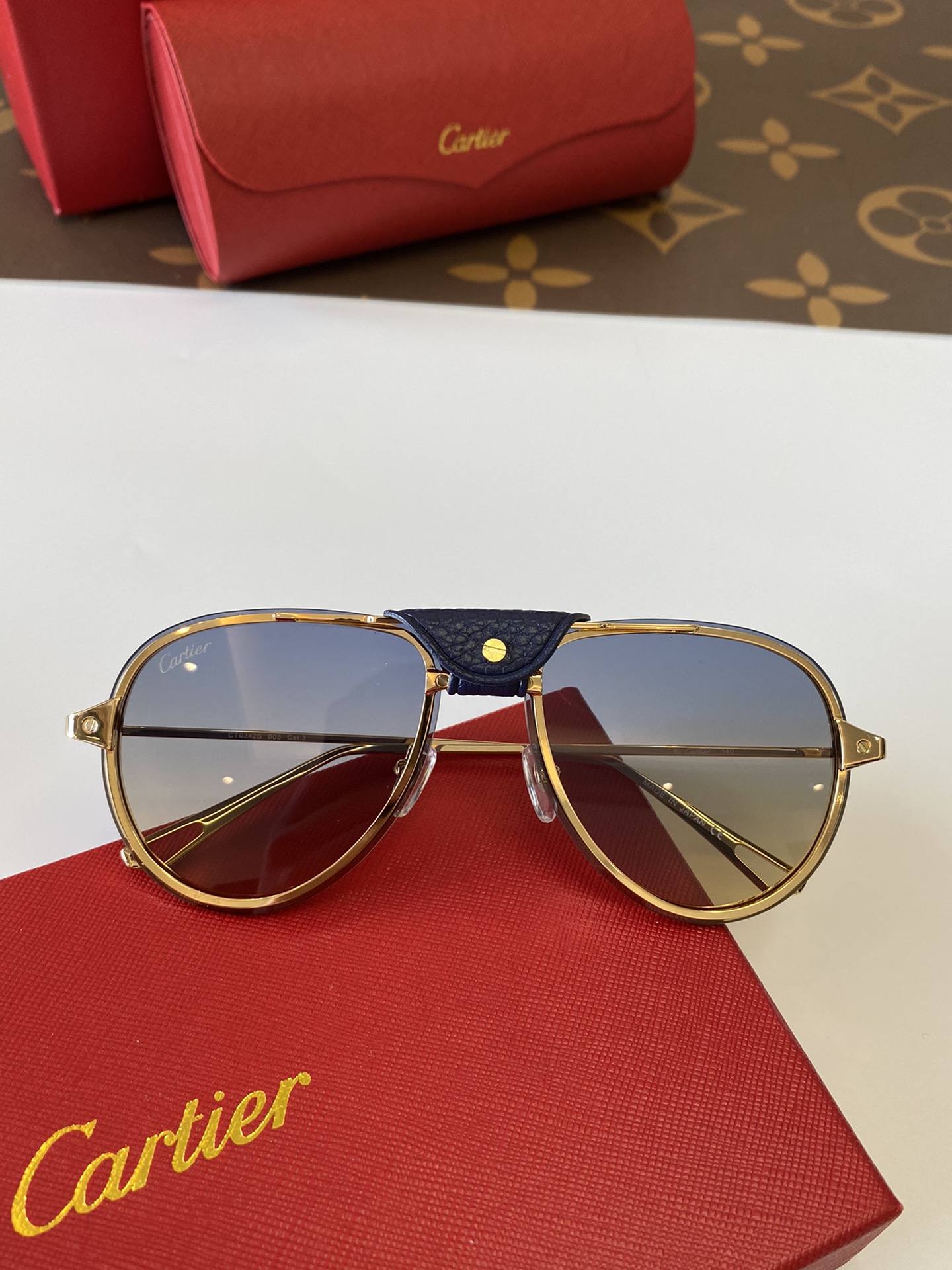 C*artier Glasses Top