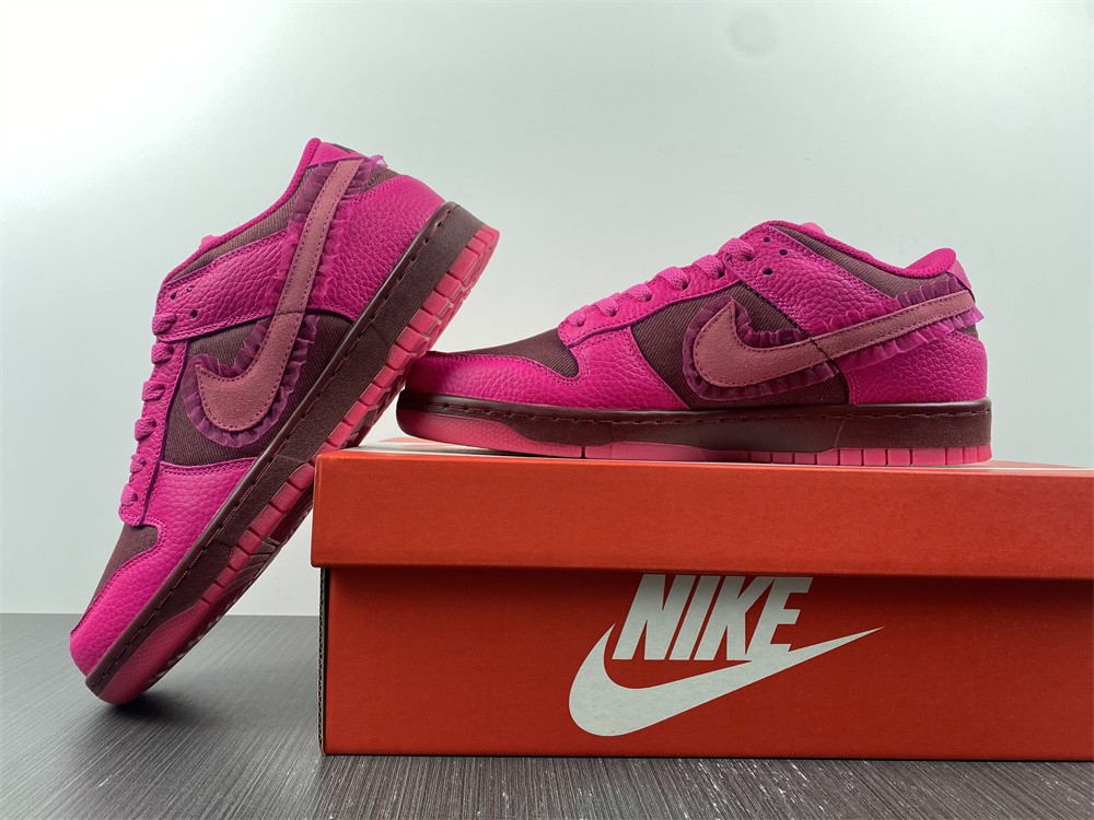 from Nike Spruces Up Its Dunk Low Team Red/Pink DQ9324-600