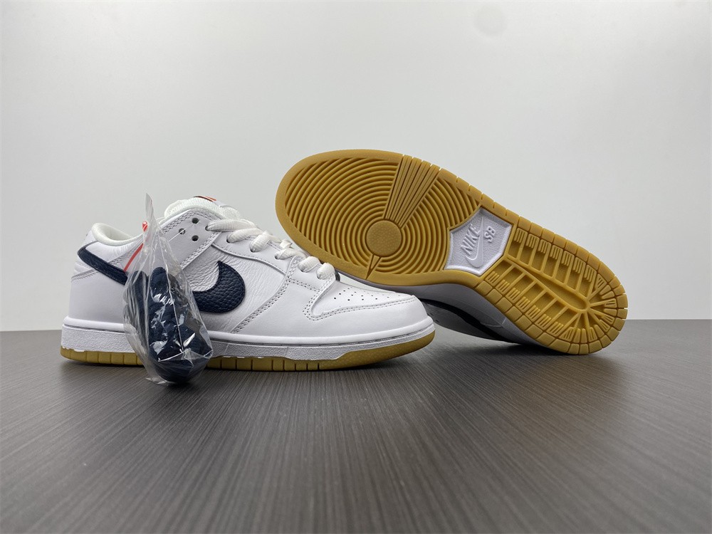 from Nike Dunk SB Low Orange Label White Navy CZ2249-100
