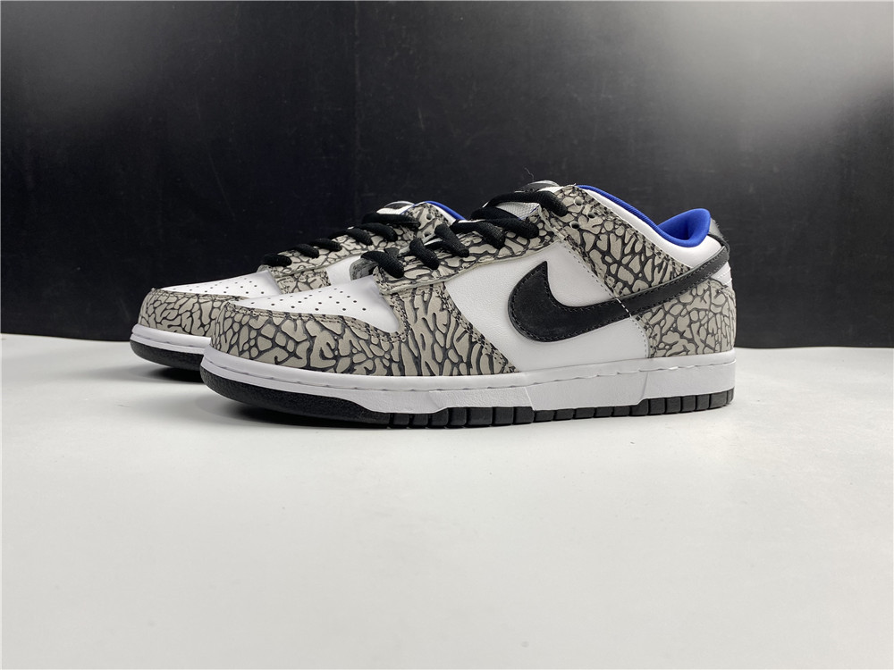 from Supreme × Nike SB Dunk Low “White Cement 304292-001
