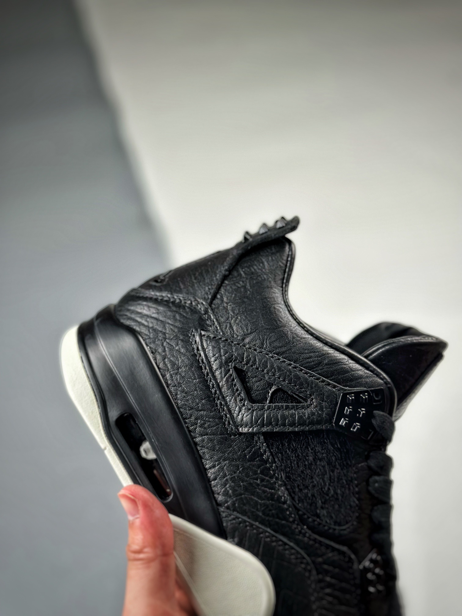 Air Jordan 4 pony hair black