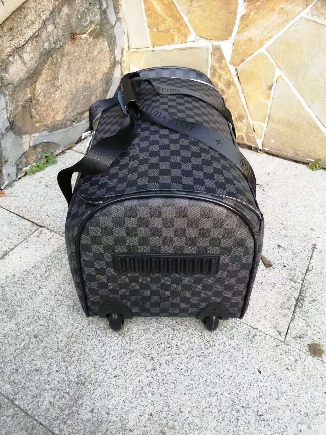 L*ouis V*uitton Luggage